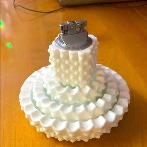 Vintage milk glass stacking ashtrays.